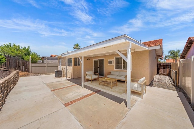 27583 Genevieve Dr, Menifee, CA 92586 - back of house featuring stucco siding, a patio area, and outdoor lounge area