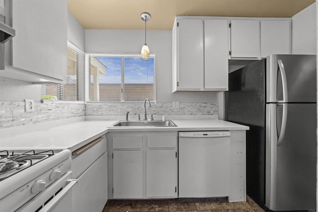 27583 Genevieve Dr, Menifee, CA 92586 - kitchen featuring white appliances, plenty of natural light, hanging light fixtures, and light countertops