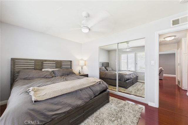 8412 San Marino Dr, Buena Park, CA 90620 - bedroom with dark wood-style flooring, a closet, and a ceiling fan
