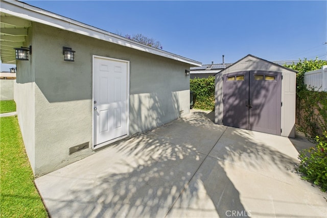 8412 San Marino Dr, Buena Park, CA 90620 - view of patio with a storage unit
