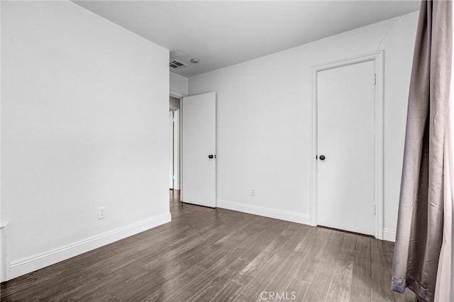 17959 Cantara St, Reseda, CA 91335 - unfurnished bedroom featuring wood finished floors and baseboards