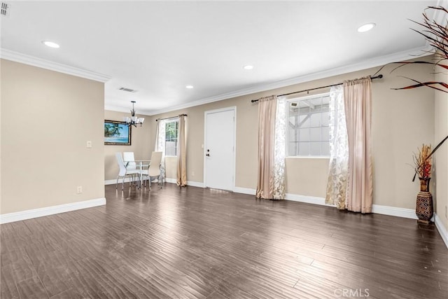 17959 Cantara St, Reseda, CA 91335 - unfurnished living room featuring ornamental molding, a chandelier, dark wood-style floors, and recessed lighting