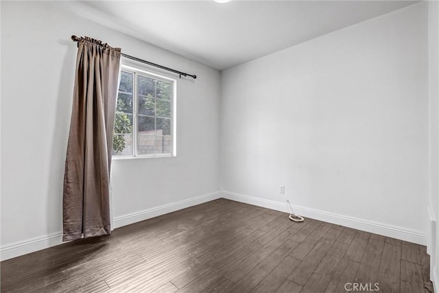 17959 Cantara St, Reseda, CA 91335 - empty room featuring dark wood-type flooring