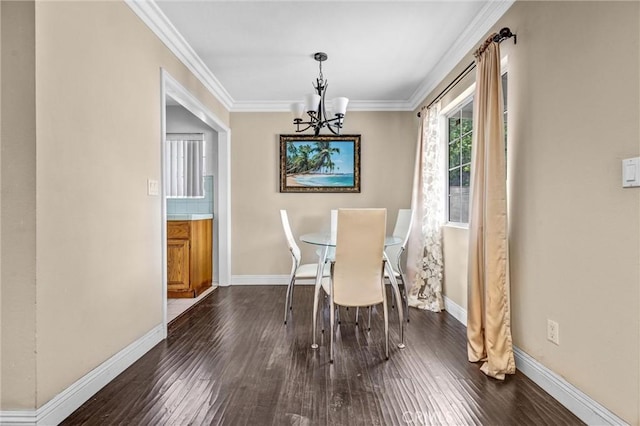17959 Cantara St, Reseda, CA 91335 - dining area featuring a chandelier, crown molding, and dark wood finished floors
