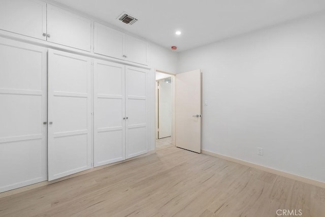 18720 Keswick St, Reseda, CA 91335 - unfurnished bedroom with light wood-type flooring, recessed lighting, and a closet