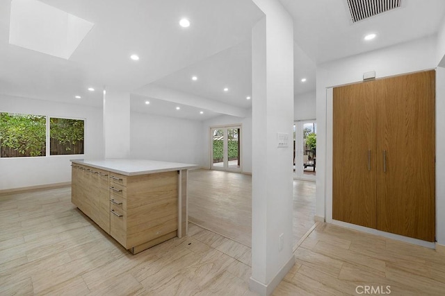 18720 Keswick St, Reseda, CA 91335 - kitchen featuring modern cabinets, recessed lighting, a kitchen island, light countertops, and open floor plan