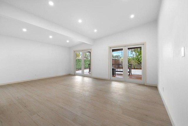 18720 Keswick St, Reseda, CA 91335 - unfurnished room featuring vaulted ceiling, french doors, light wood-type flooring, and recessed lighting
