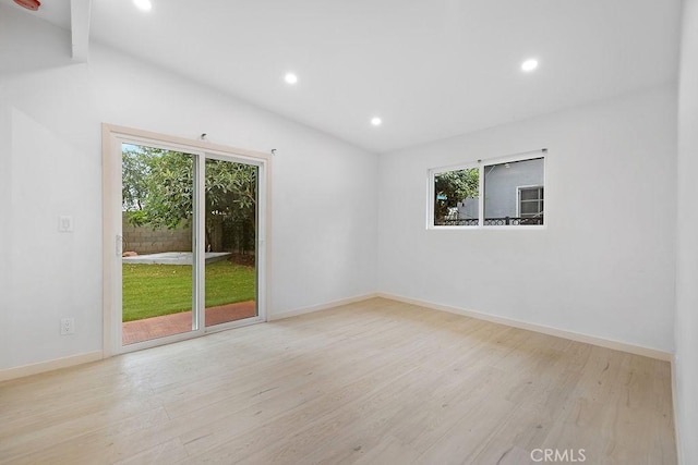 18720 Keswick St, Reseda, CA 91335 - spare room featuring vaulted ceiling, wood finished floors, and recessed lighting