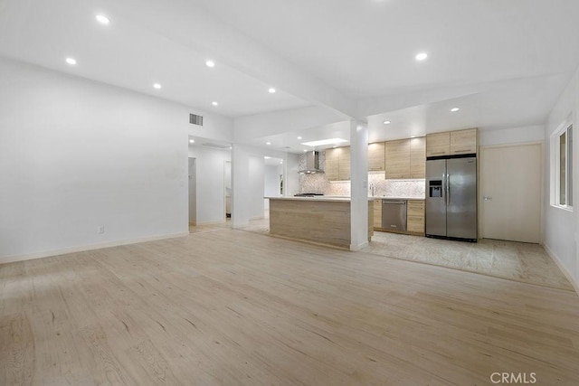 18720 Keswick St, Reseda, CA 91335 - unfurnished living room featuring light wood finished floors and recessed lighting