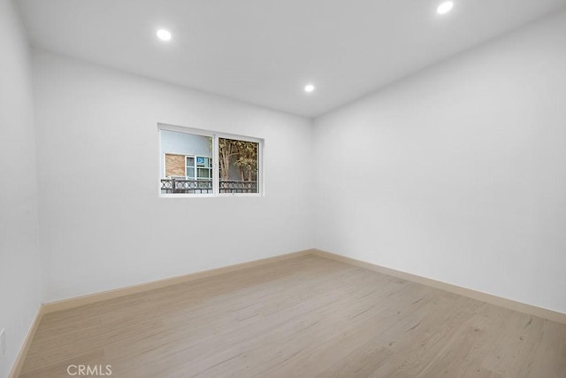 18720 Keswick St, Reseda, CA 91335 - empty room with light wood-style floors and recessed lighting