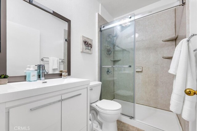 3284 Barham Blvd Unit 201, Los Angeles, CA 90068 - full bathroom with vanity, a stall shower, and tile patterned floors