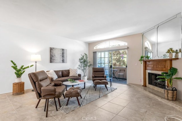 3284 Barham Blvd Unit 201, Los Angeles, CA 90068 - living area with a fireplace with raised hearth and tile patterned floors