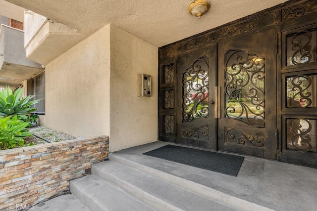 3284 Barham Blvd Unit 201, Los Angeles, CA 90068 - doorway to property featuring stucco siding