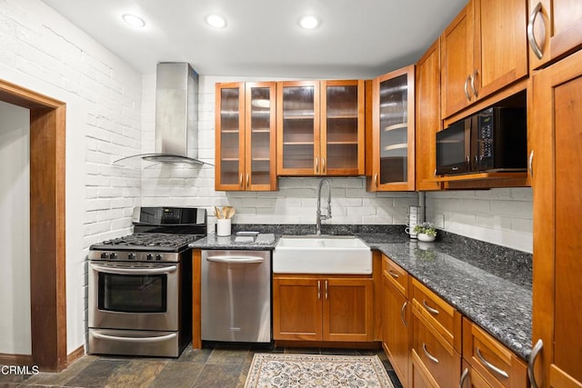 5245 Ramsdell Ave, La Crescenta, CA 91214 - kitchen with stainless steel gas range oven, wall chimney exhaust hood, black microwave, brown cabinets, and glass insert cabinets