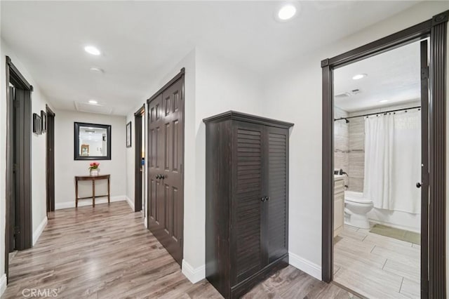 1346 Butler Way, Upland, CA 91786 - hallway with light wood-style floors and recessed lighting