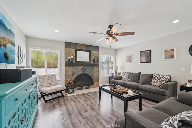 1346 Butler Way, Upland, CA 91786 - living area with a fireplace, ceiling fan, wood finished floors, and recessed lighting