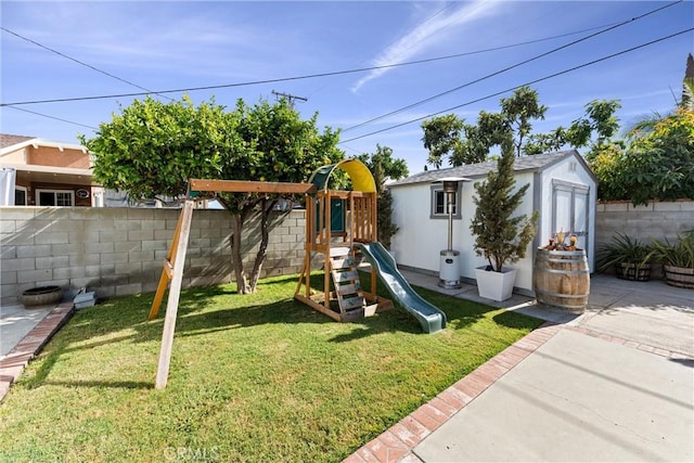 14508 S Corlett Ave, Compton, CA 90220 - view of play area featuring a fenced backyard and an outdoor structure