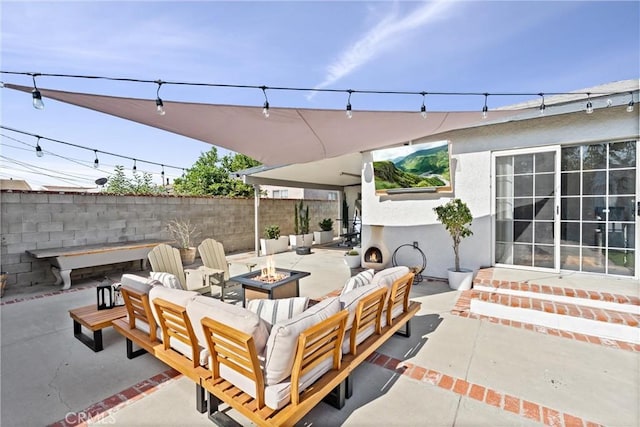 14508 S Corlett Ave, Compton, CA 90220 - view of patio / terrace featuring an outdoor living space with a fire pit