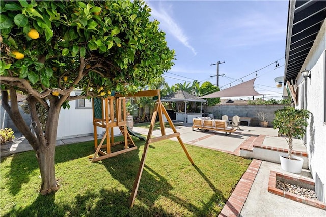 14508 S Corlett Ave, Compton, CA 90220 - fenced backyard with a gazebo, outdoor lounge area, a patio, and a playground