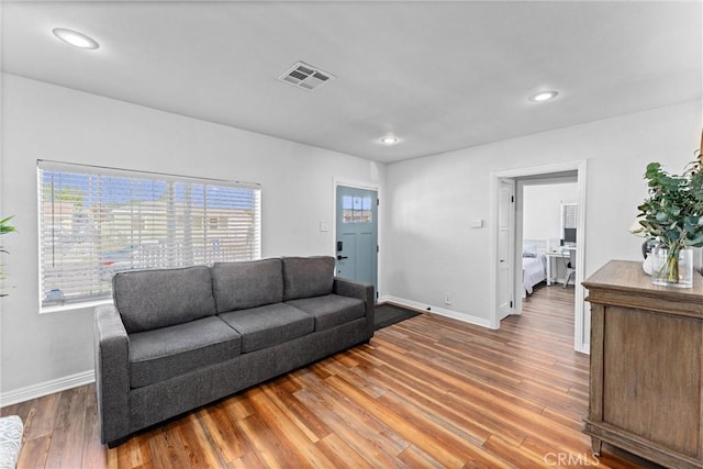 14508 S Corlett Ave, Compton, CA 90220 - living area featuring wood finished floors and recessed lighting