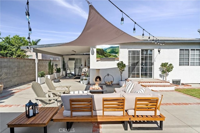 14508 S Corlett Ave, Compton, CA 90220 - view of patio featuring an outdoor living space with a fireplace