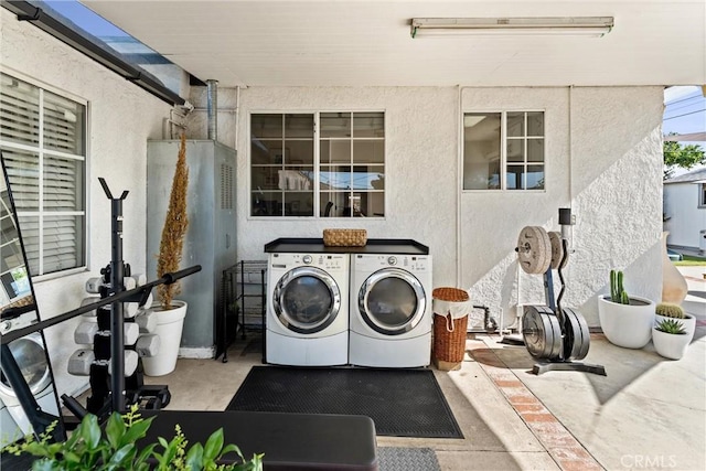 14508 S Corlett Ave, Compton, CA 90220 - laundry area with separate washer and dryer and a textured wall