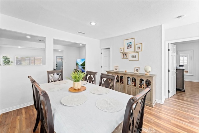 14508 S Corlett Ave, Compton, CA 90220 - dining space featuring light wood-style floors and recessed lighting