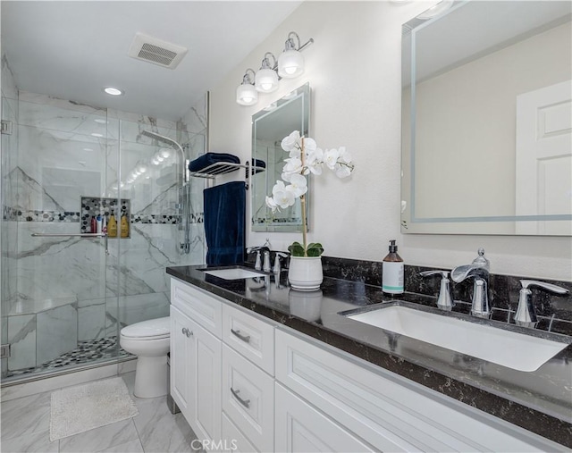 1936 W Cherry Dr, Orange, CA 92868 - bathroom featuring a marble finish shower, double vanity, marble look tile flooring, and recessed lighting