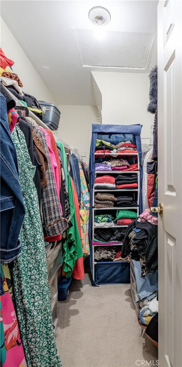 1936 W Cherry Dr, Orange, CA 92868 - spacious closet featuring attic access and carpet floors