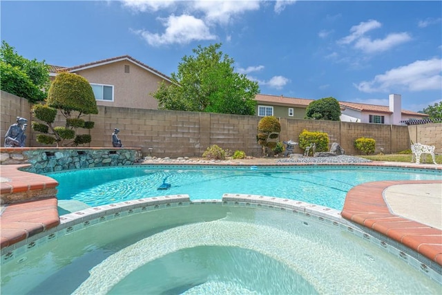 1936 W Cherry Dr, Orange, CA 92868 - view of swimming pool featuring a pool with connected hot tub and a fenced backyard