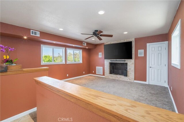 2935 Athel Dr, Hacienda Heights, CA 91745 - unfurnished living room with ceiling fan, recessed lighting, a fireplace, and light carpet