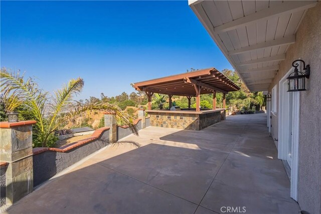 2935 Athel Dr, Hacienda Heights, CA 91745 - view of patio featuring a pergola and an outdoor kitchen
