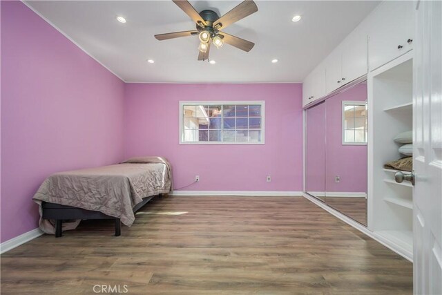 2935 Athel Dr, Hacienda Heights, CA 91745 - bedroom with wood finished floors, recessed lighting, and a ceiling fan