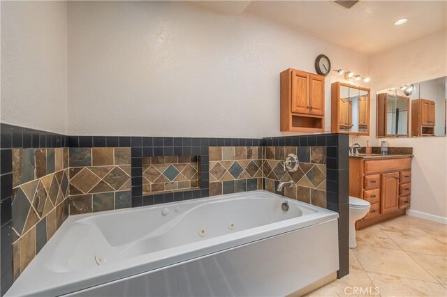 2935 Athel Dr, Hacienda Heights, CA 91745 - bathroom featuring a tub with jets, vanity, and tile patterned floors