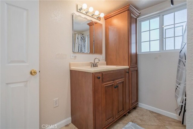 2935 Athel Dr, Hacienda Heights, CA 91745 - full bathroom with vanity and tile patterned flooring