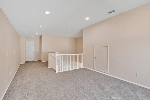 35668 Trevino Trl, Beaumont, CA 92223 - empty room with carpet floors, recessed lighting, and vaulted ceiling