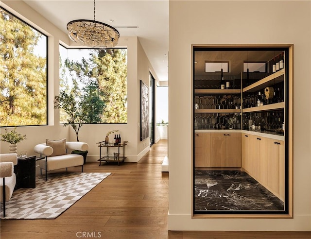 1955 Curson Pl, Los Angeles, CA 90046 - bar area with a chandelier and hardwood / wood-style flooring
