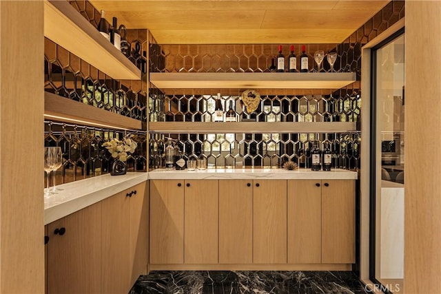 1955 Curson Pl, Los Angeles, CA 90046 - wine area with dark marble finish flooring