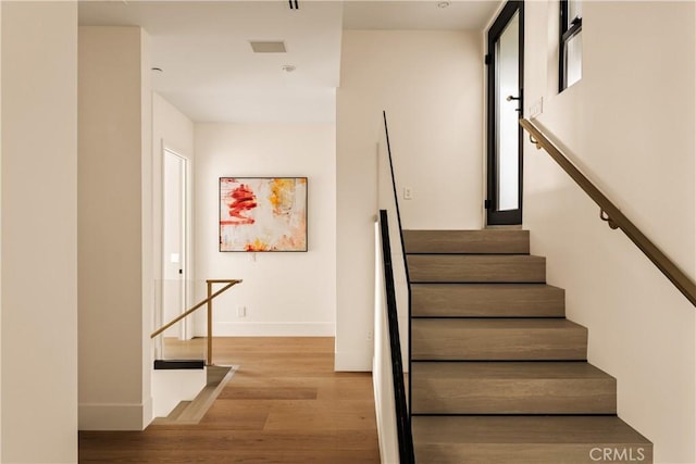 1955 Curson Pl, Los Angeles, CA 90046 - stairway with wood finished floors and baseboards