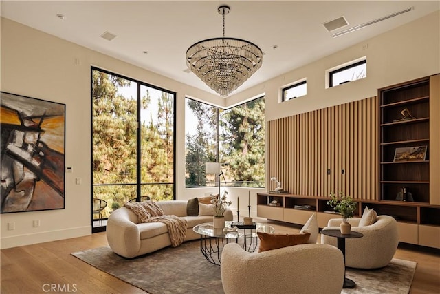 1955 Curson Pl, Los Angeles, CA 90046 - living area with a chandelier and wood finished floors