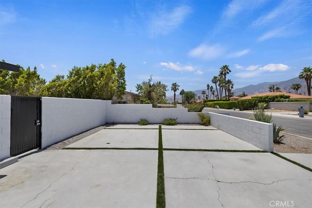 2002 N Whitewater Club Dr N, Palm Springs, CA 92262 - view of patio with a mountain view