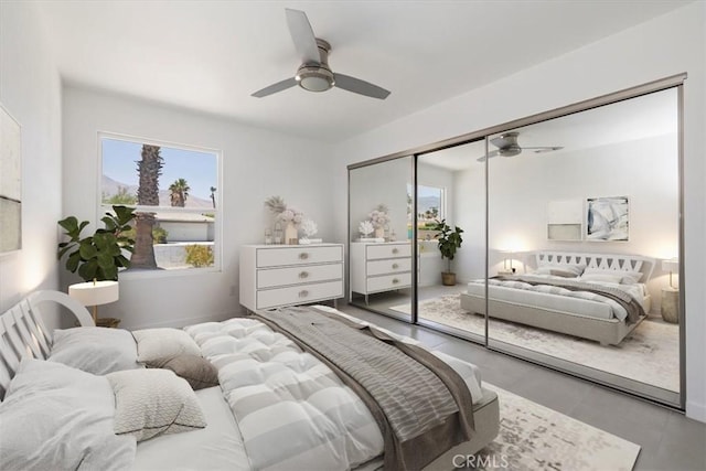 2002 N Whitewater Club Dr N, Palm Springs, CA 92262 - bedroom featuring a closet and ceiling fan