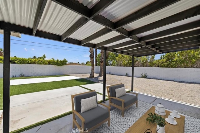 2002 N Whitewater Club Dr N, Palm Springs, CA 92262 - fenced backyard with a patio area