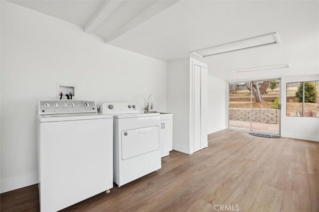 2141 Sierra Way, San Luis Obispo, CA 93401 - washroom with cabinet space, washing machine and dryer, and wood finished floors