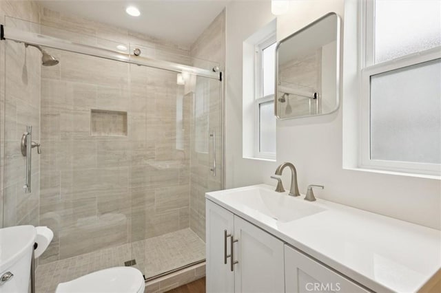 2141 Sierra Way, San Luis Obispo, CA 93401 - bathroom with healthy amount of natural light, vanity, a shower stall, and recessed lighting