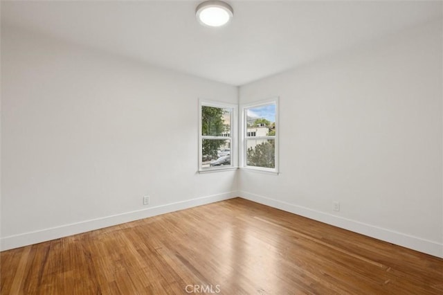 2141 Sierra Way, San Luis Obispo, CA 93401 - unfurnished room with baseboards and light wood-style flooring