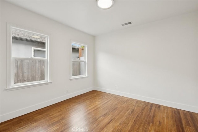 2141 Sierra Way, San Luis Obispo, CA 93401 - spare room featuring baseboards and wood finished floors