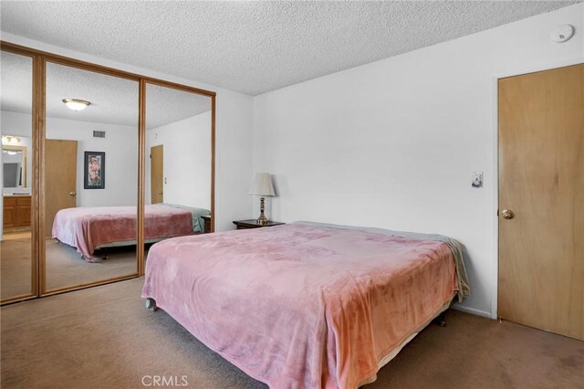18944 Prairie St, Northridge, CA 91324 - carpeted bedroom with a textured ceiling and a closet