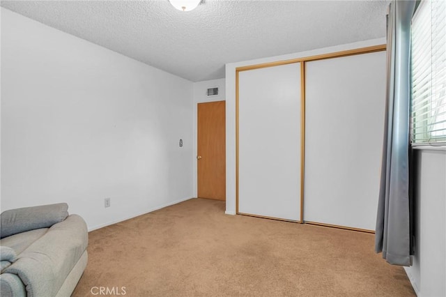 18944 Prairie St, Northridge, CA 91324 - living area with carpet floors and a textured ceiling