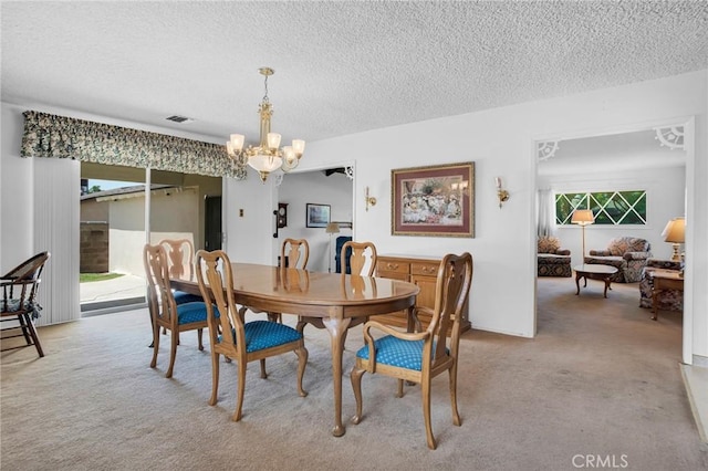 18944 Prairie St, Northridge, CA 91324 - carpeted dining area with a chandelier and a textured ceiling